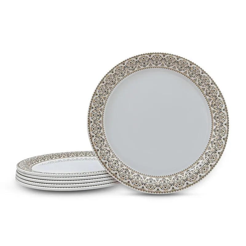 White dinner plates arranged in a stack with one plate standing upright