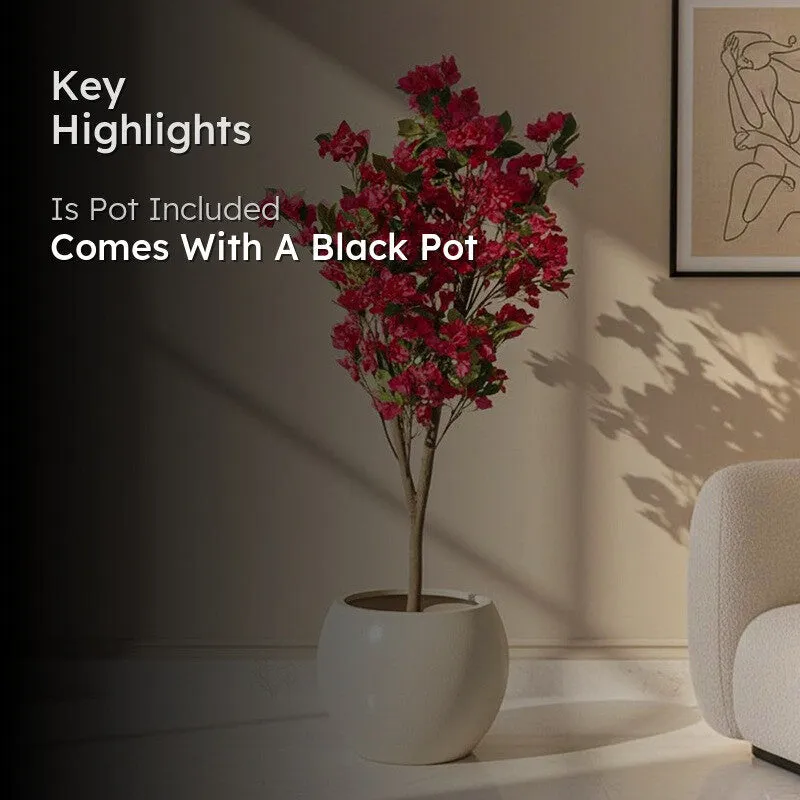 Faux bougainvillea in a white planter with a key highlight about the black pot