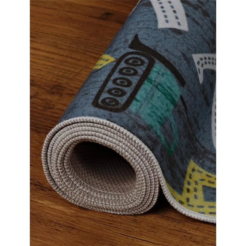 Rolled corner of the grey printed carpet showing edge finish and underside