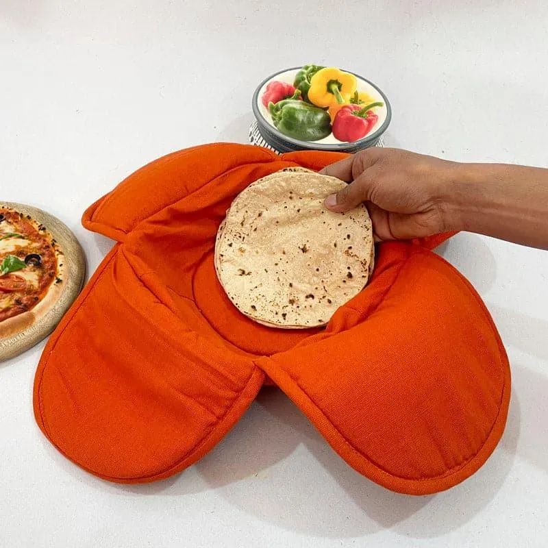 Hand placing a flatbread into the rust bread basket