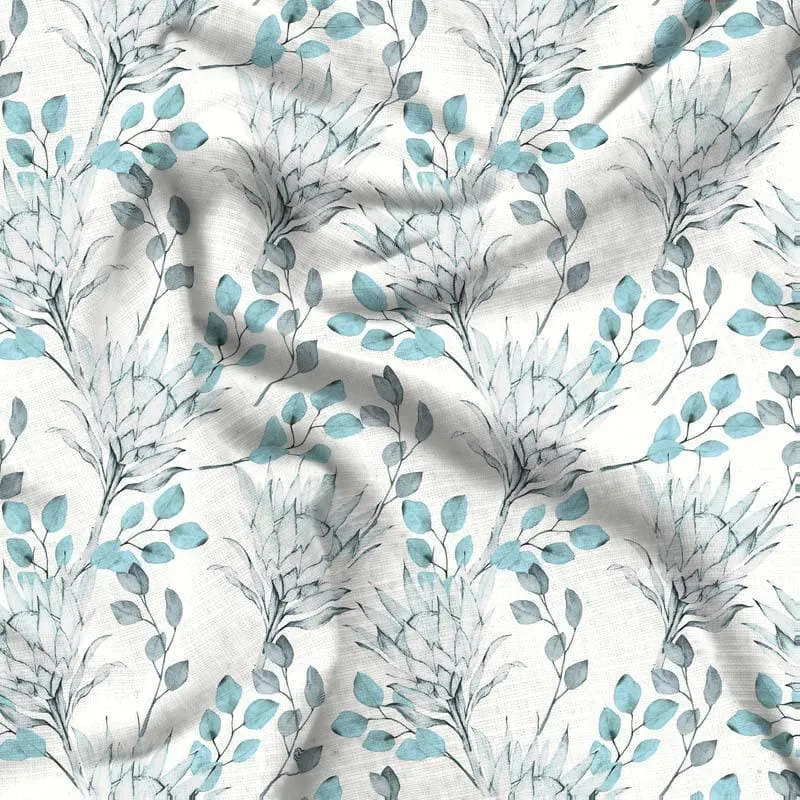 Close-up of white cotton bedsheet with blue leafy floral print