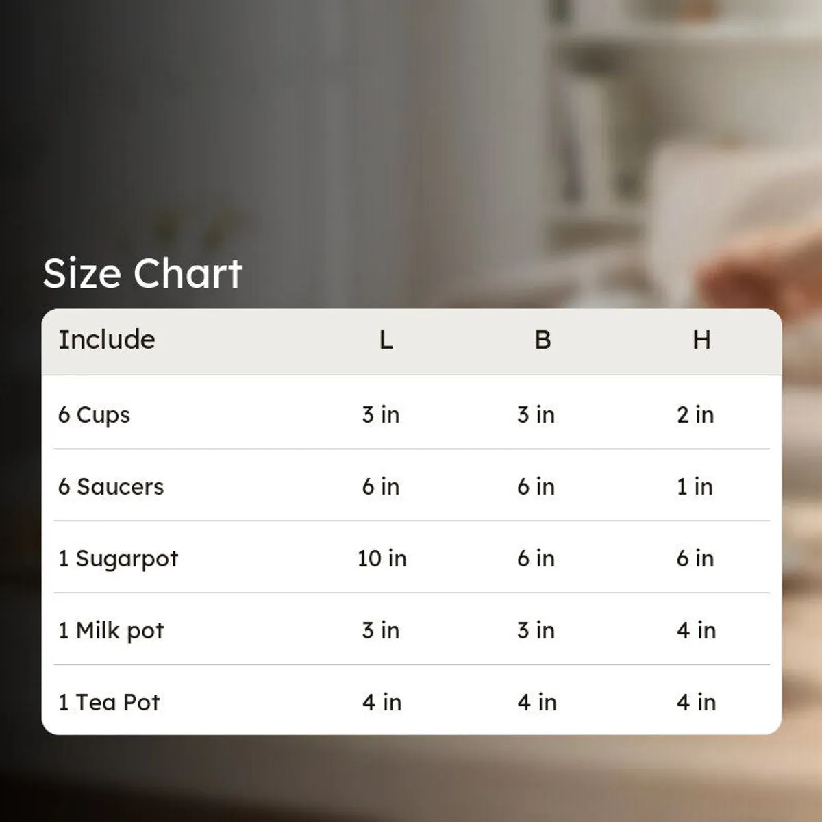White tea set displayed beside a size chart