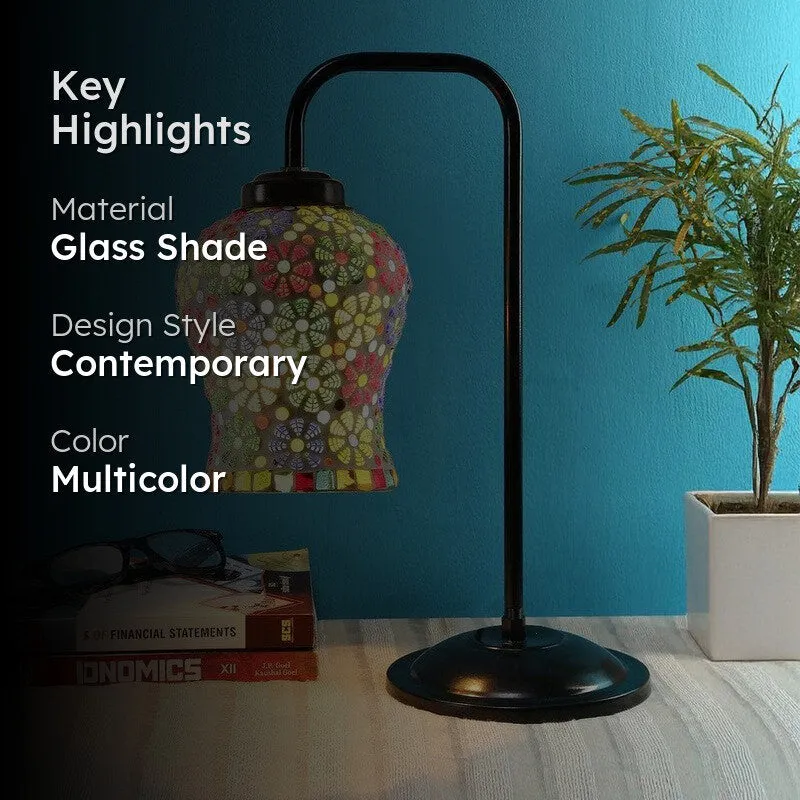 Styled image of the lit mosaic table lamp with text overlay on a blue background.
