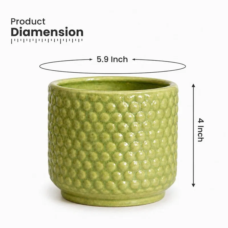 Green ceramic planter shown with product dimensions