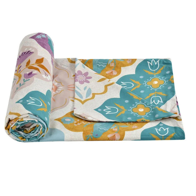 Folded multicolour printed cotton duvet cover with ethnic motifs