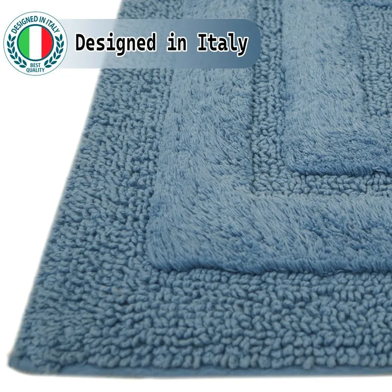 Close-up of the light blue rug showing its tufted textured surface