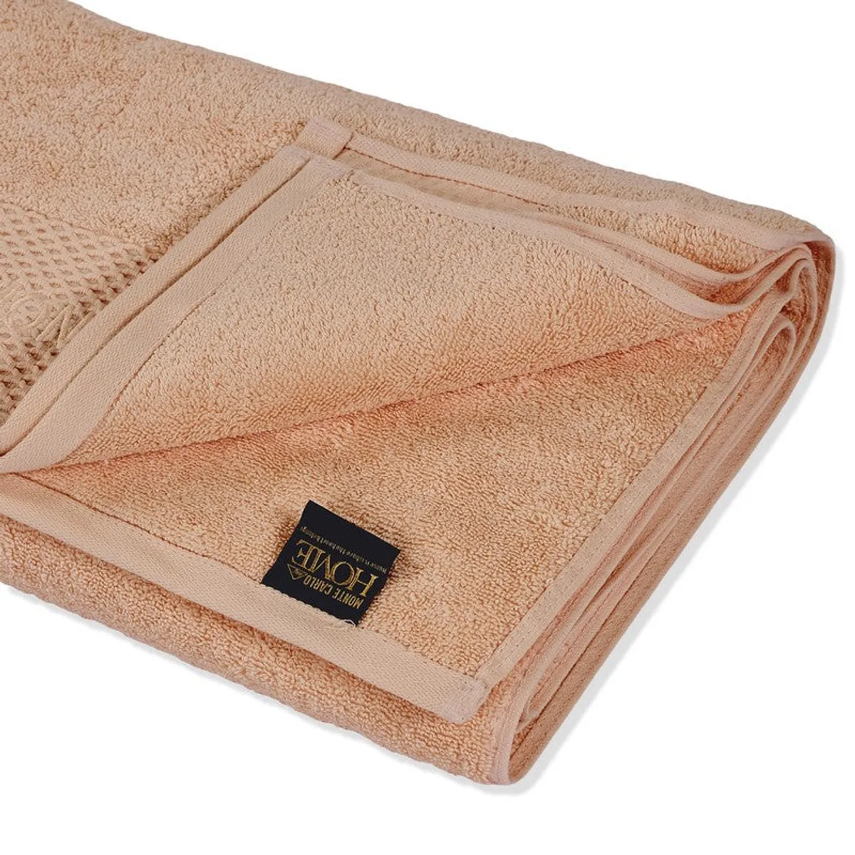 Close-up of the plush cotton towel edge, border and sewn label