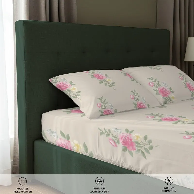 Close-up of pink floral print on bedsheet and pillow covers