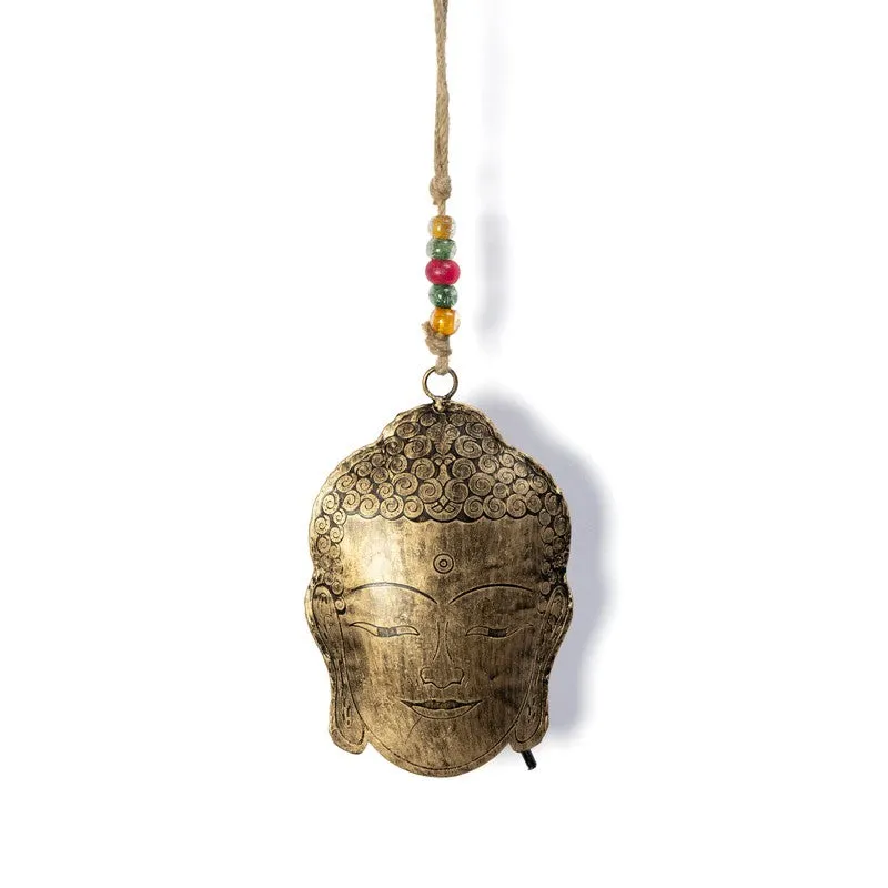 Gold Buddha-face hanging bell with colourful beads against a white background