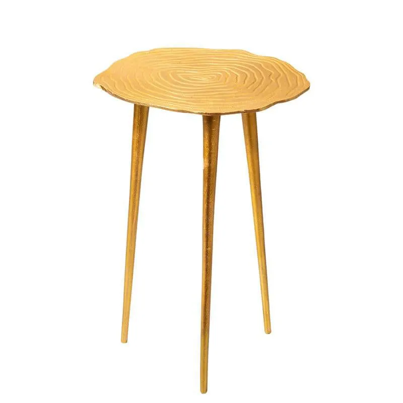 Gold accent table with textured top and three slender legs