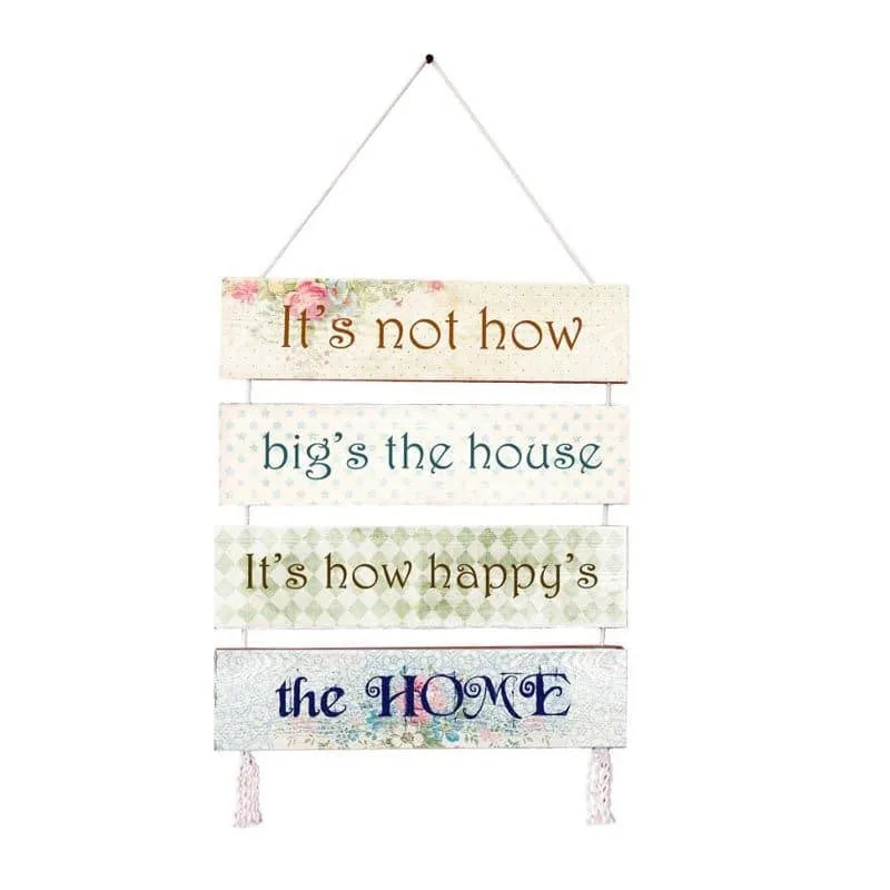 Front view of a four-panel multicolour wall hanging with lettering, rope hanger and tassels.