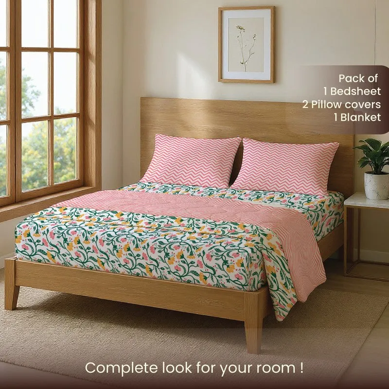 Bedding set styled on a wooden bed in a bright bedroom