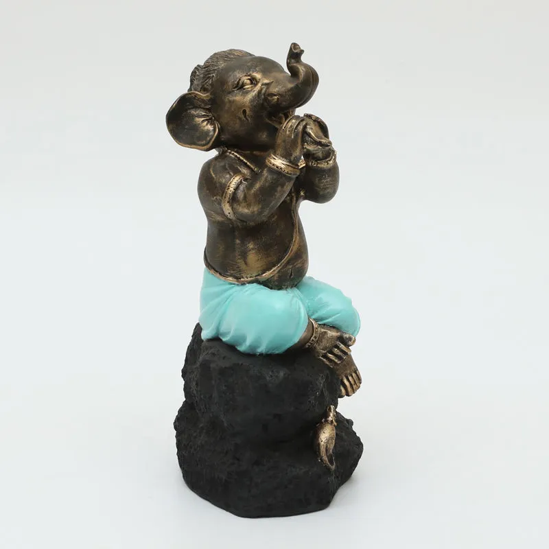 Playful Vinayaka Showpiece - Brown, Blue media 4