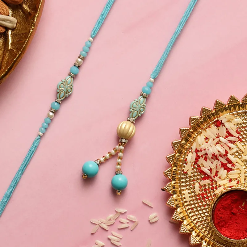 Bhaiya-Bhabhi Rakhi with Roli Chawal - Three Piece Set media 3
