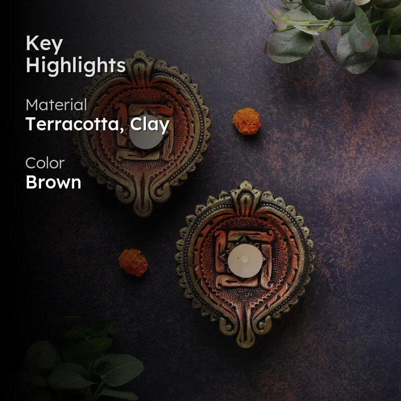 Divine Swastika Terracotta Diya - Set Of Two media 2