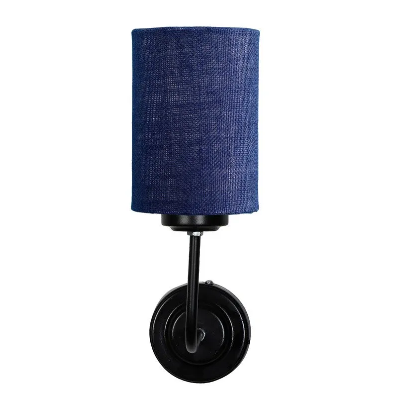 Front view of blue cylindrical wall lamp with black round wall plate