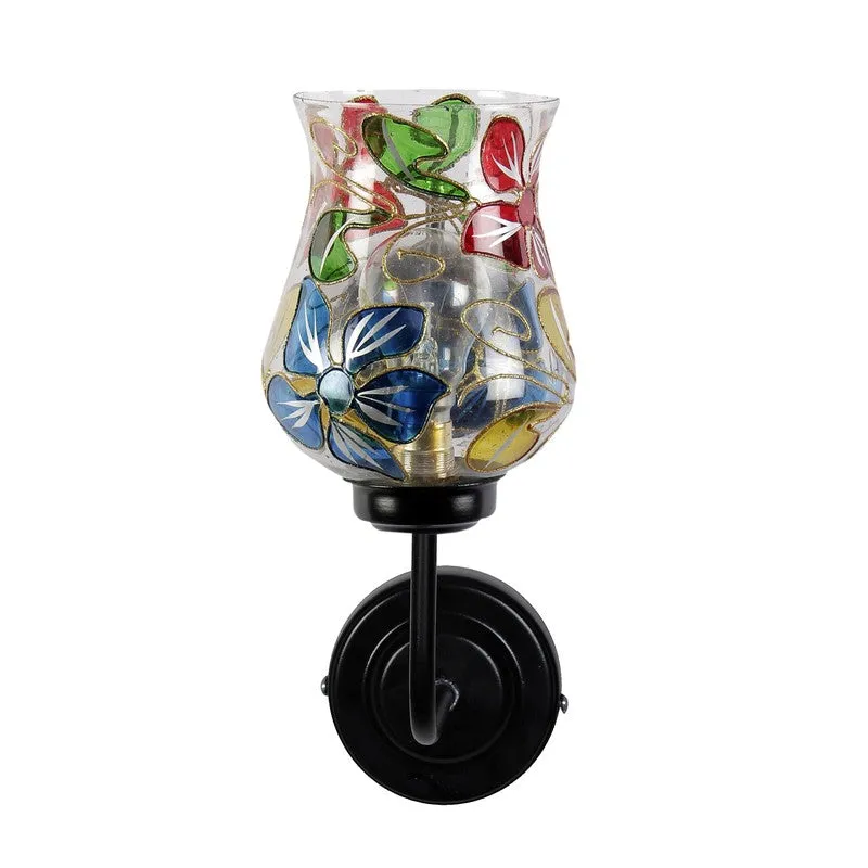 Front view of multicolour floral glass wall lamp on black iron mount