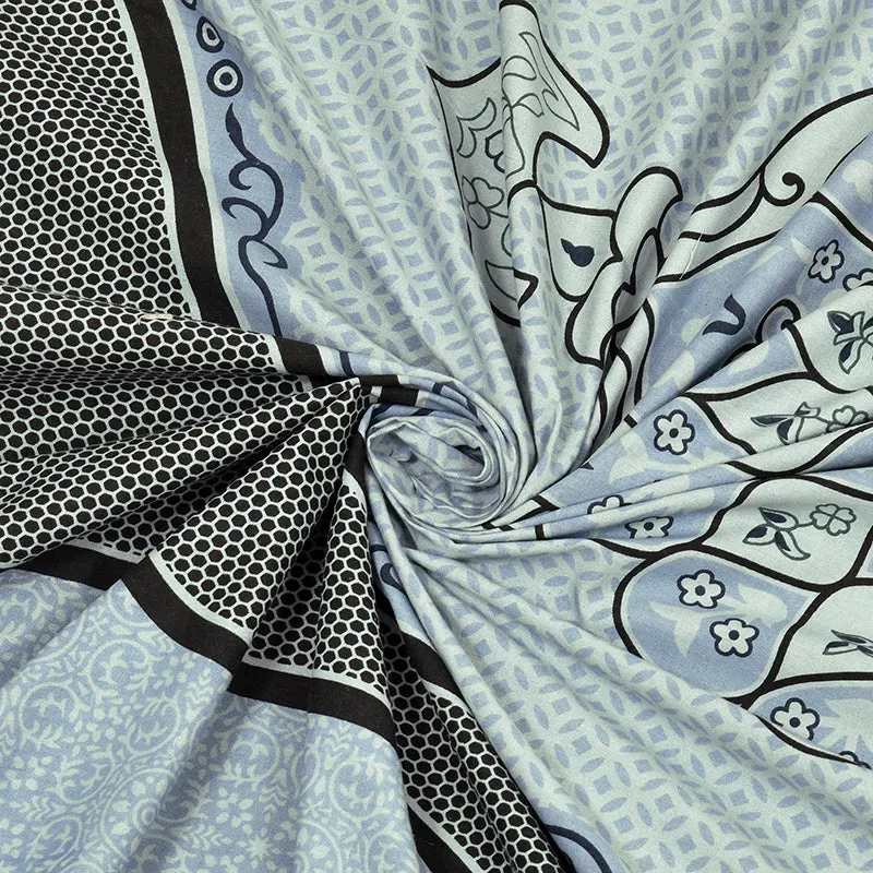 Close-up of the sky blue cotton bedsheet fabric and printed pattern
