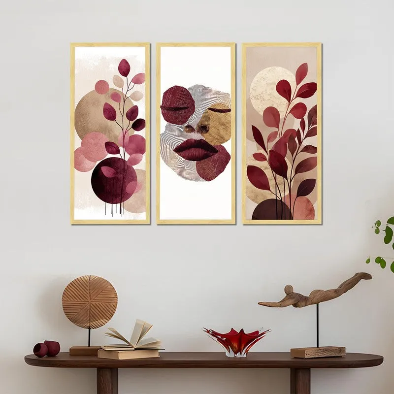 Three vertical framed art panels displayed above a wooden console table