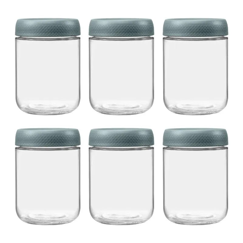 Six clear glass storage jars arranged in two rows against a white background.