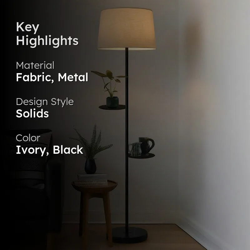 Floor lamp with ivory shade and shelves with material and colour highlights