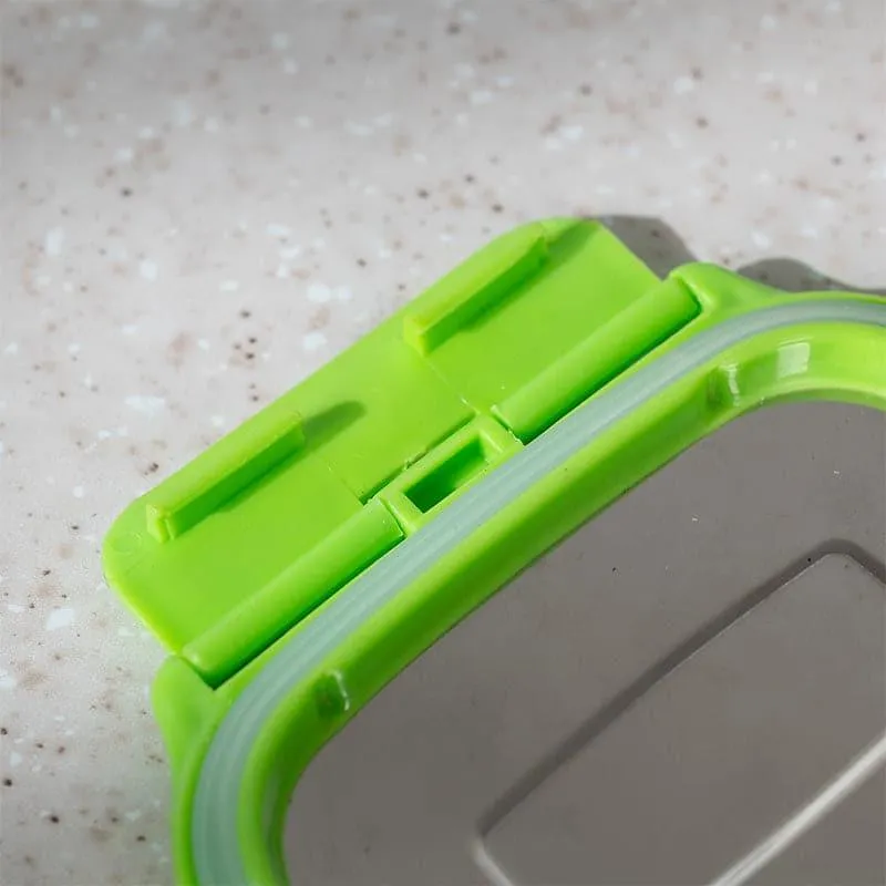 Close-up of a green-lidded stainless steel lunch box with grey trim