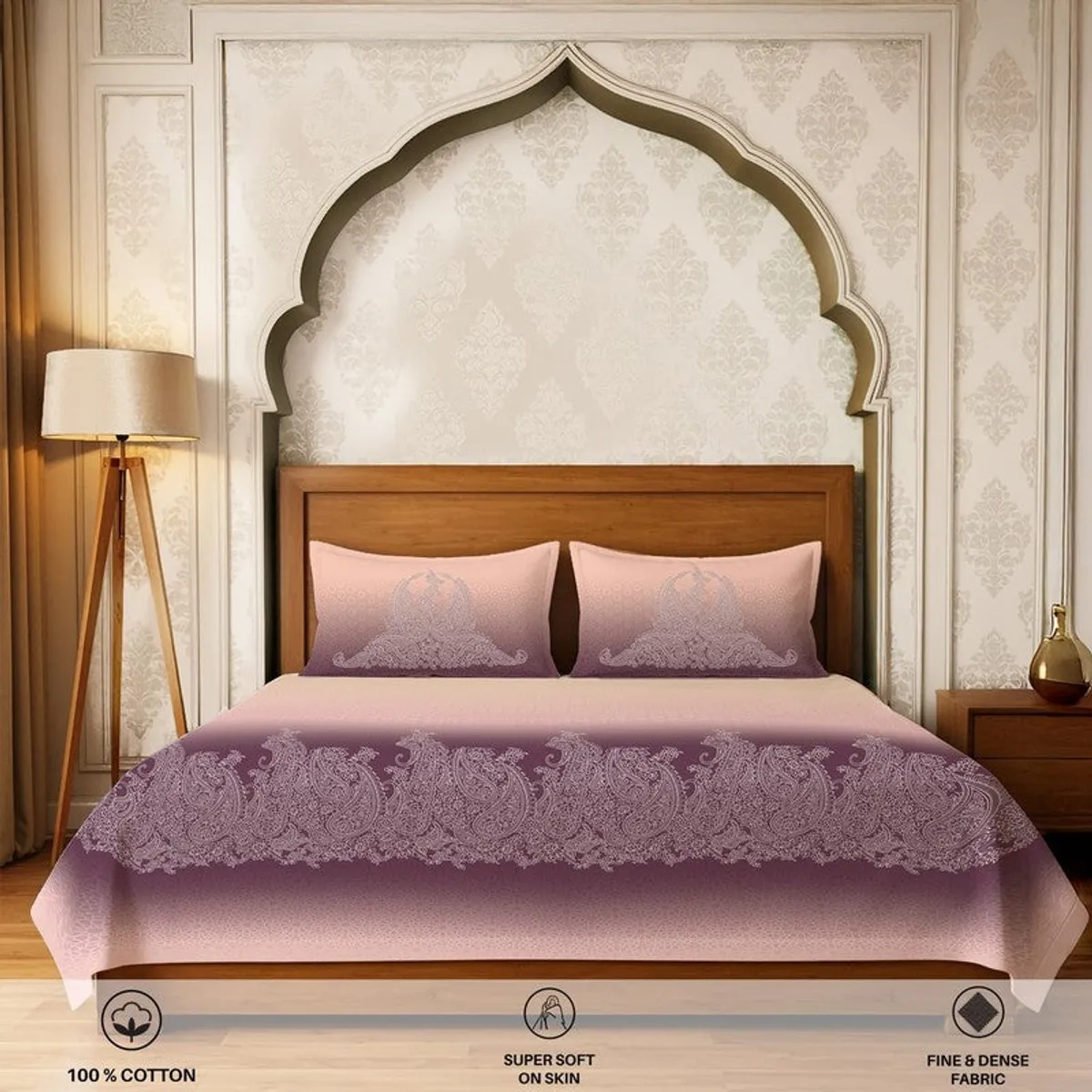 Front view of pink and purple bedsheet set with matching pillow covers on a bed