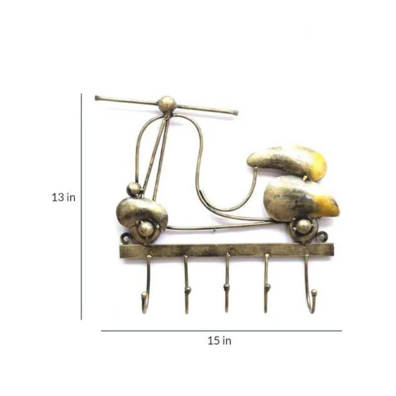 Scooter-shaped key holder shown with dimension markers