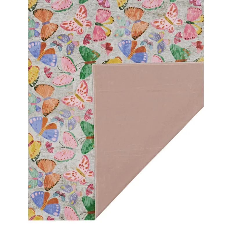 Corner view of butterfly print carpet with plain underside