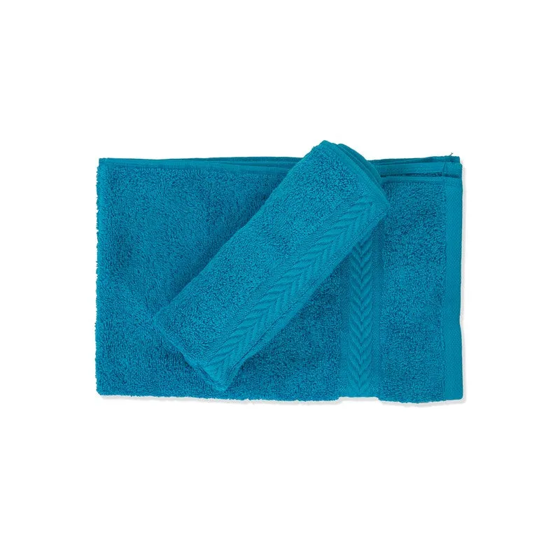 Two blue hand towels folded on a white background