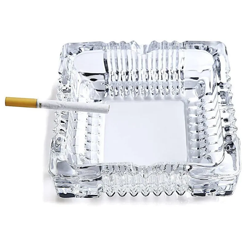 Transparent square glass ashtray shown from above on a white background