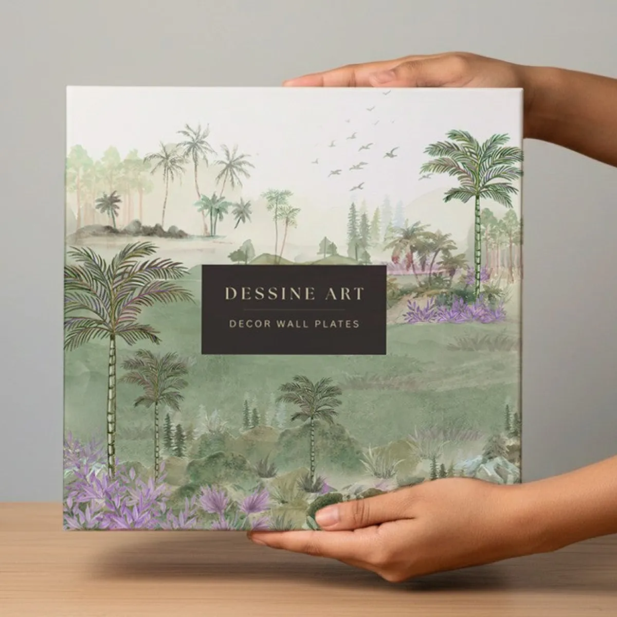 Decorative Dessine Art wall plate gift box held in both hands
