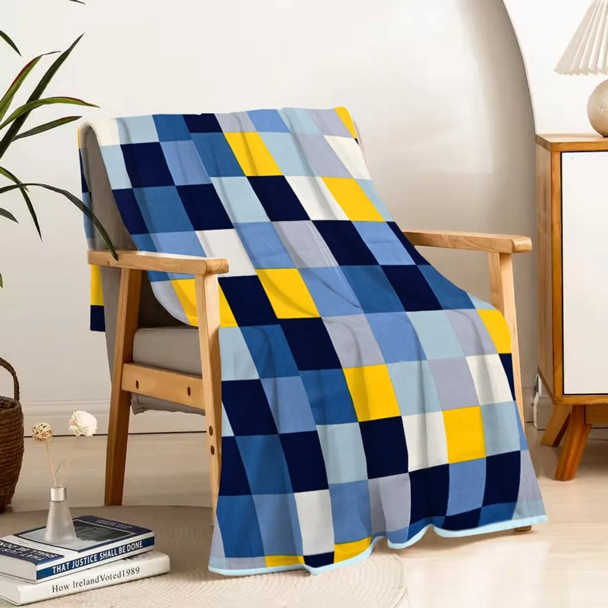 Checked blue and yellow dohar draped over a wooden armchair