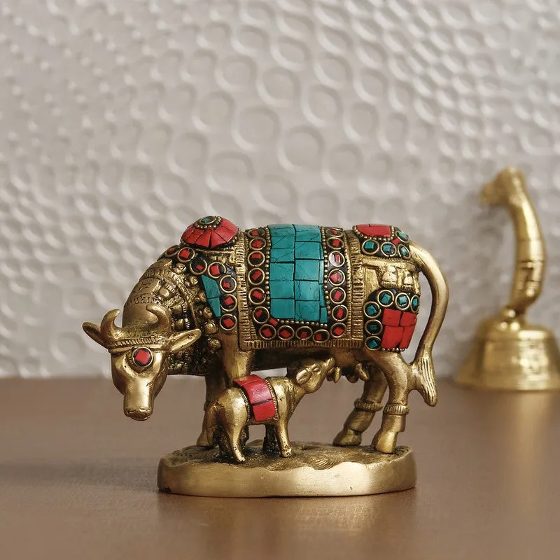 Decorative Gau Mata brass idol with red and turquoise detailing