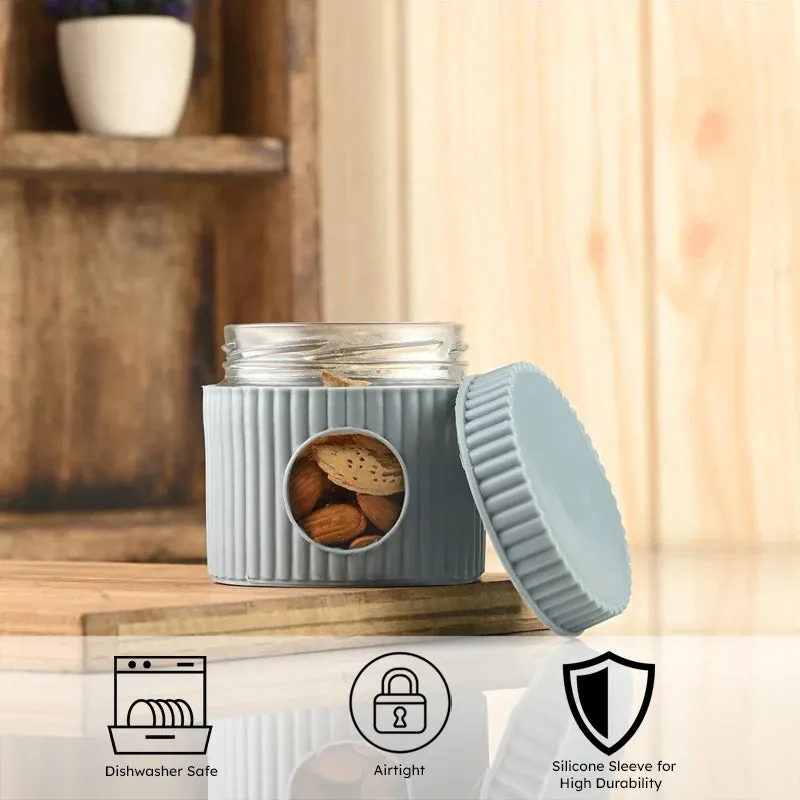 Grey ribbed jar with lid beside it, shown with dishwasher-safe and airtight icons
