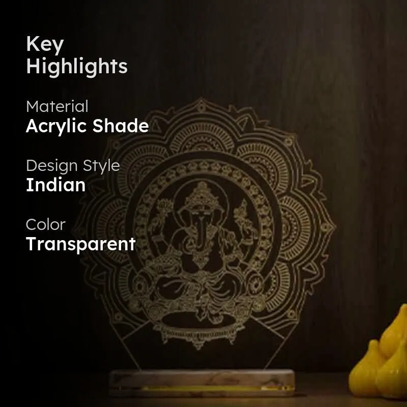 Decorative acrylic Ganesha table lamp shown in a dim setting