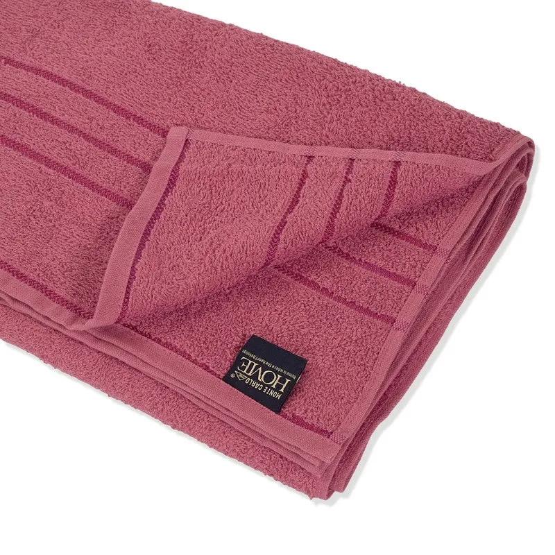 Close-up of dusty pink bath towel with border detail