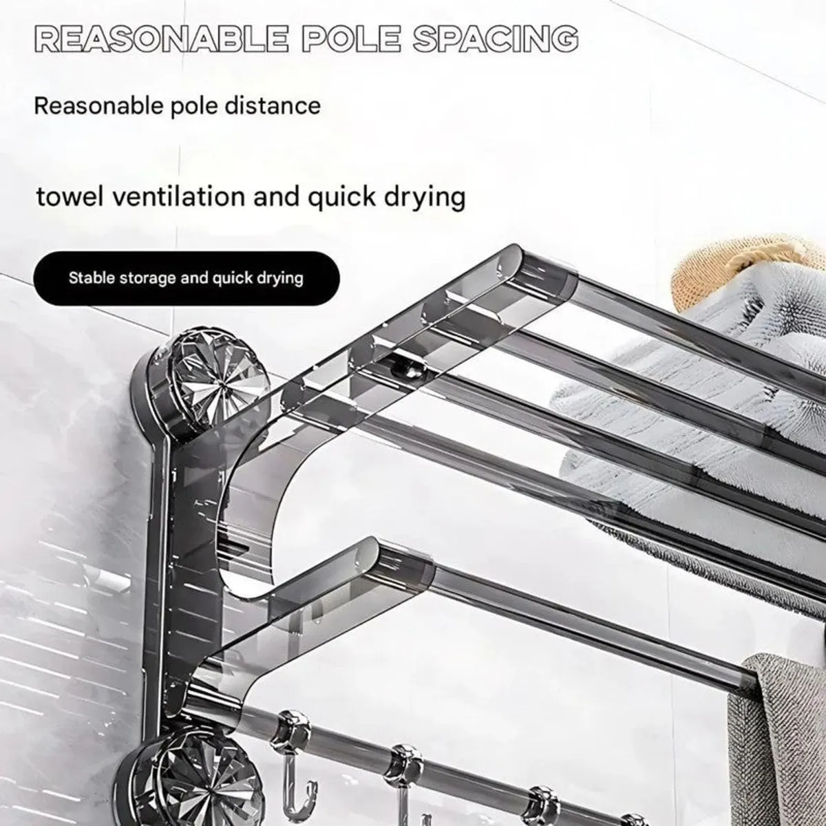 Close-up of silver wall-mounted hanger with shelf, rail and hooks