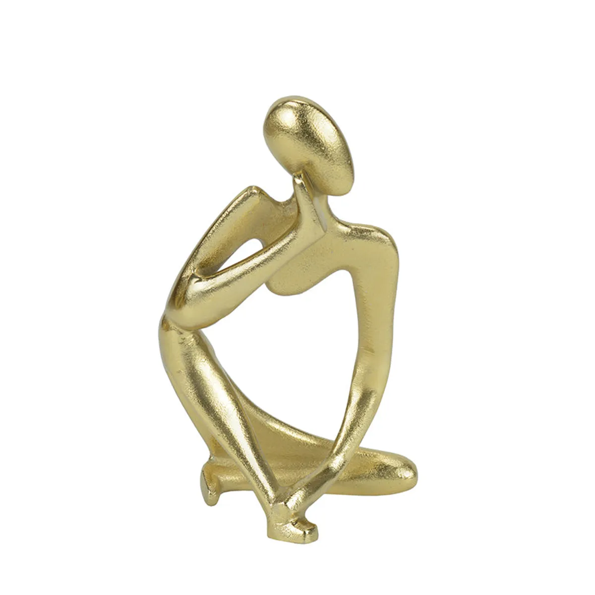 Front view of a gold abstract seated figurine showpiece on a white background