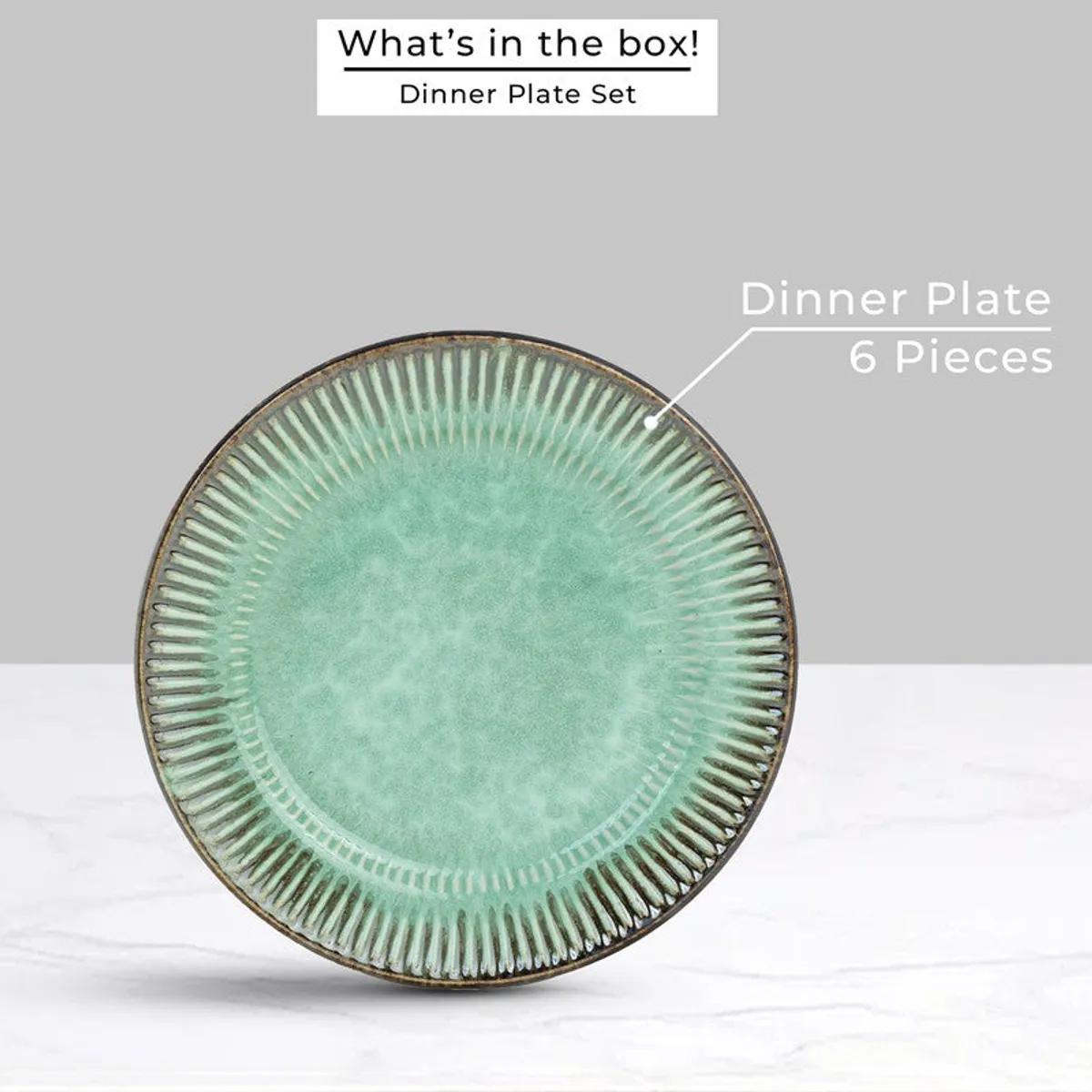 Single green round dinner plate with a glossy, textured radial rim