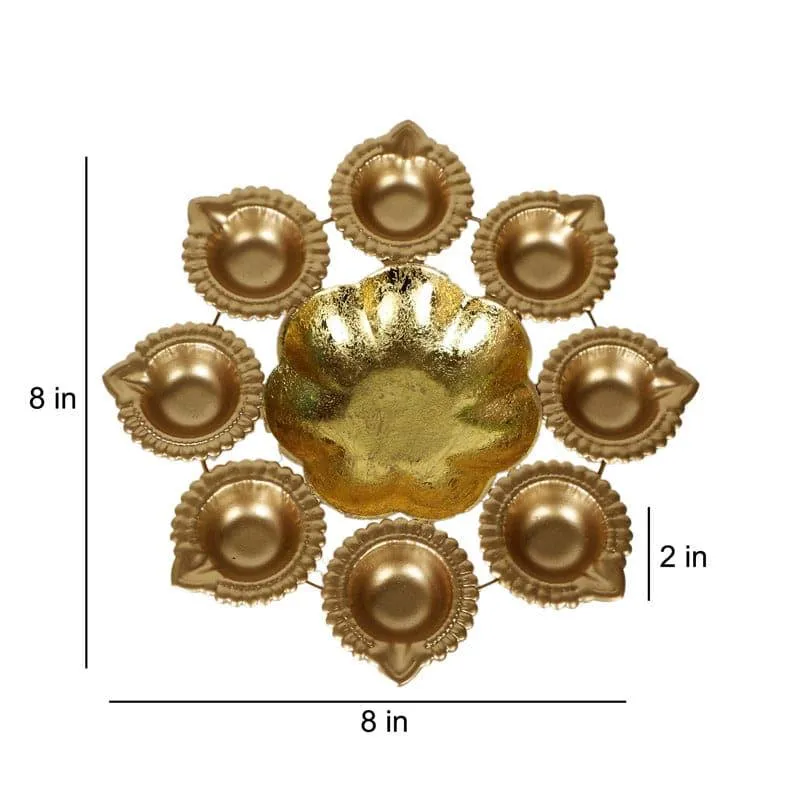 Single gold urli with surrounding diya holders shown with size markings