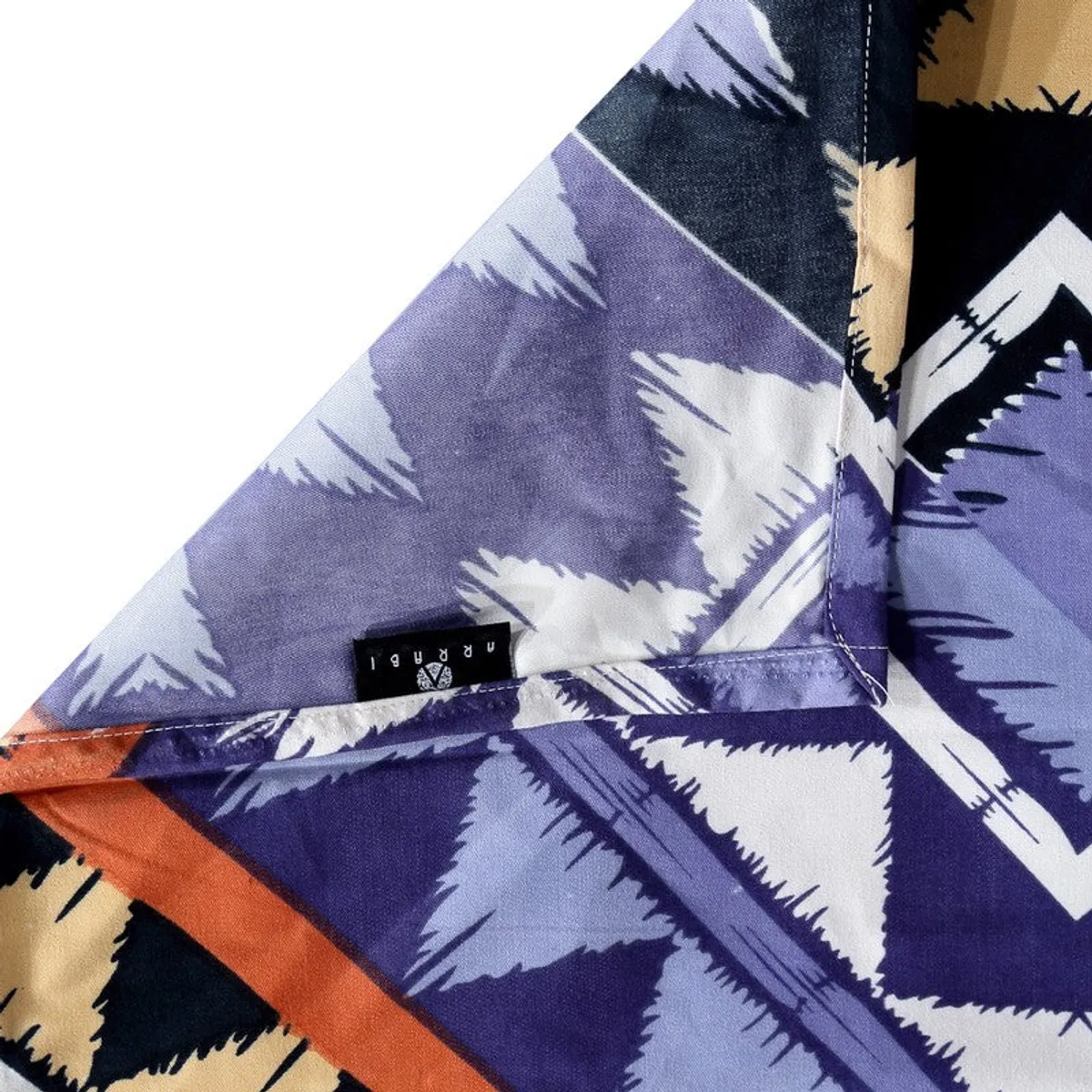Folded corner detail of the printed diwan set fabric