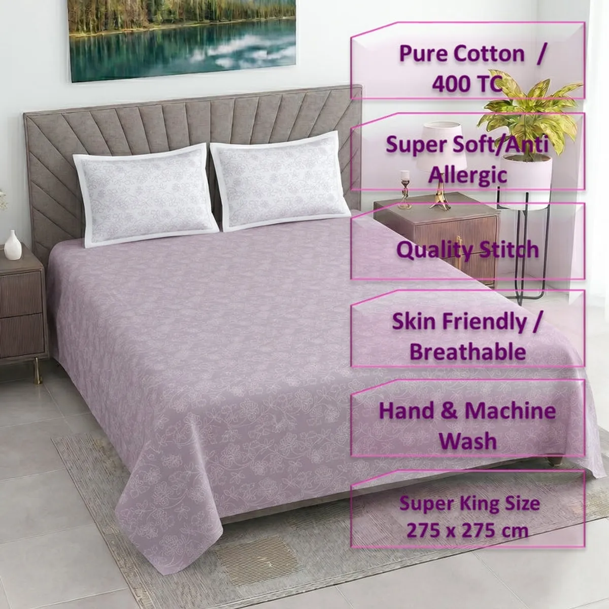 Styled bedroom view with pink floral bedsheet on the bed