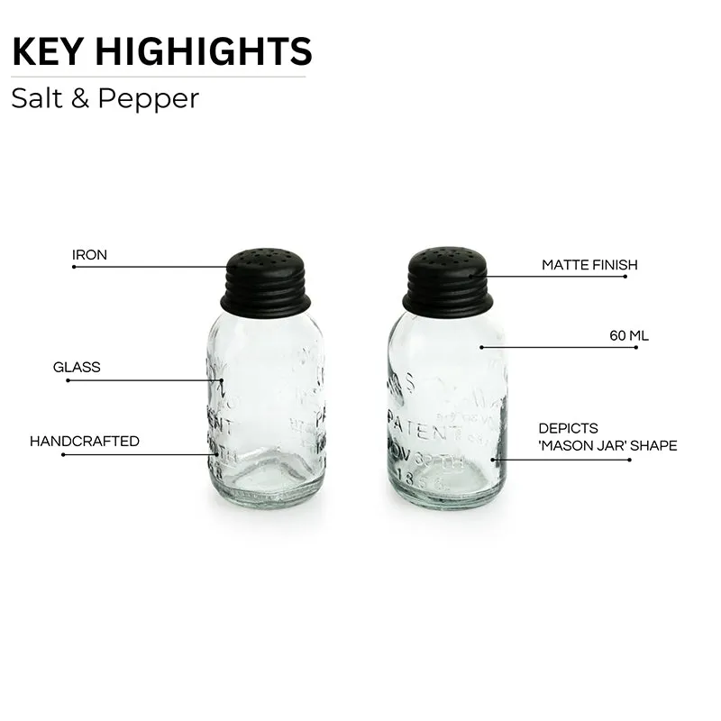 Two glass shakers with black lids showing embossed jar-style detailing