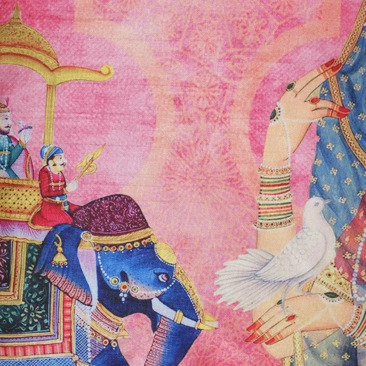 Close-up of pink cushion cover with elephant, woman and dove motif
