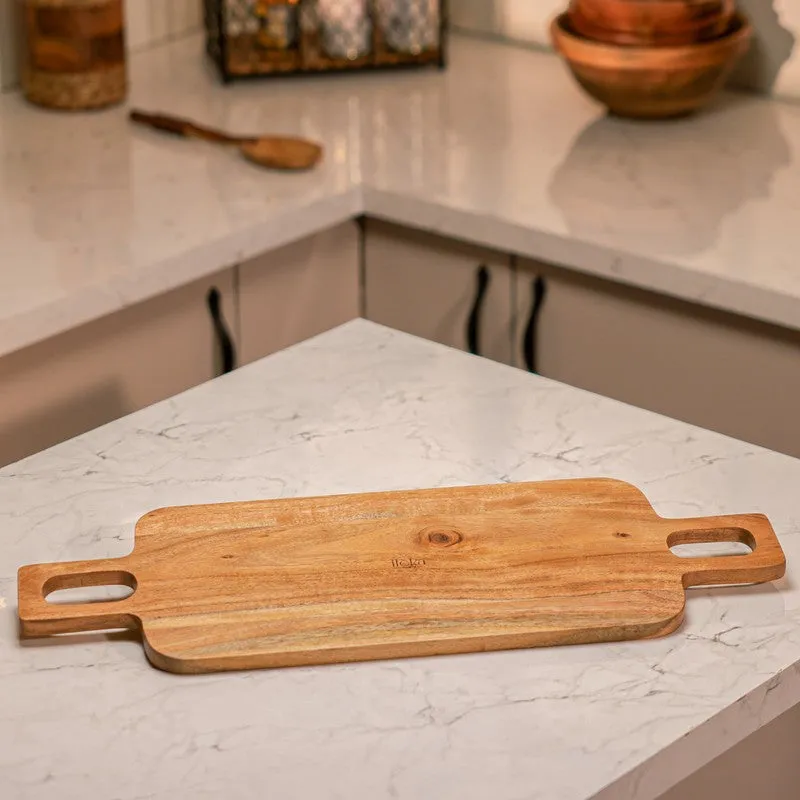 Brown wooden chopping board displayed on a kitchen counter