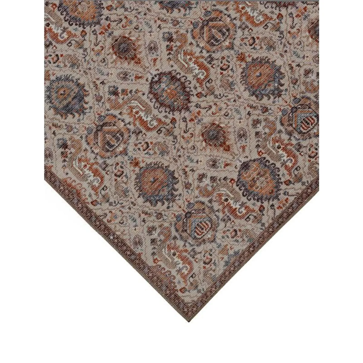Detailed pointed corner of a brown ethnic-patterned carpet