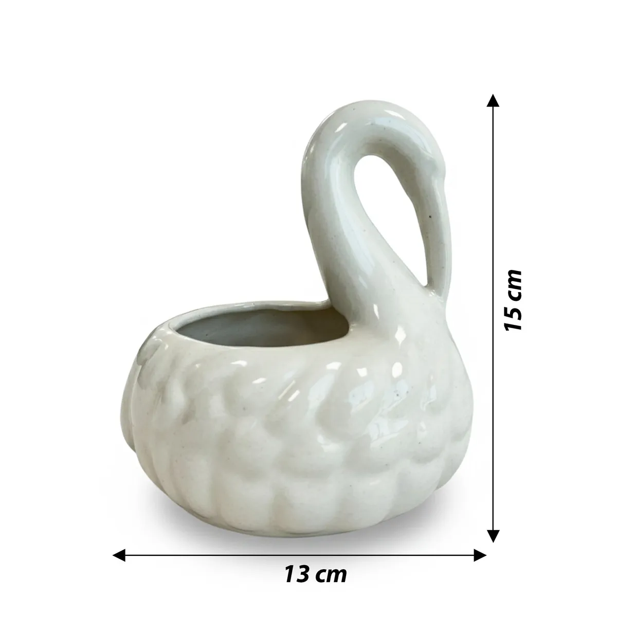 White swan-shaped vase on a plain background
