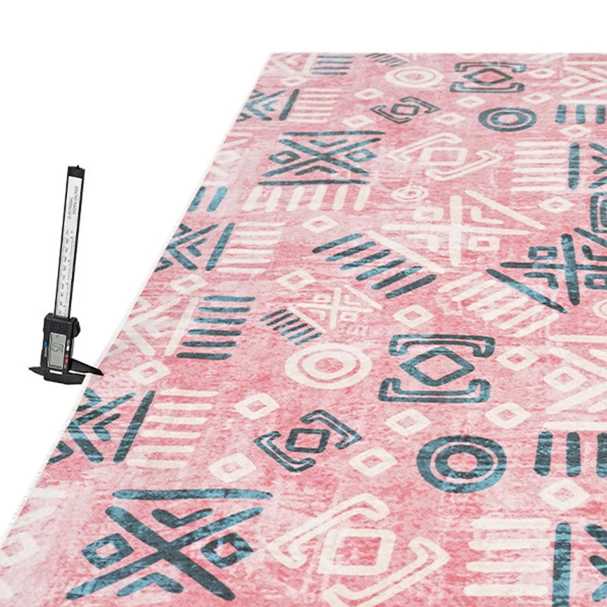 Close view of pink abstract carpet surface and thin profile