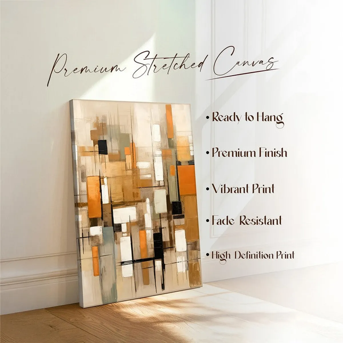 Abstract canvas wall art leaning against a wall in soft sunlight